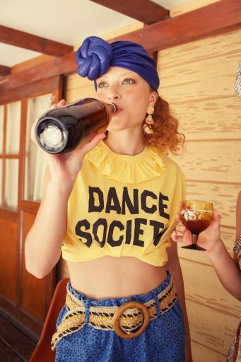Sisters Department,"Sleeveless t-shirt w/ collar | Yellow w/ ""dance society"" print" [1]