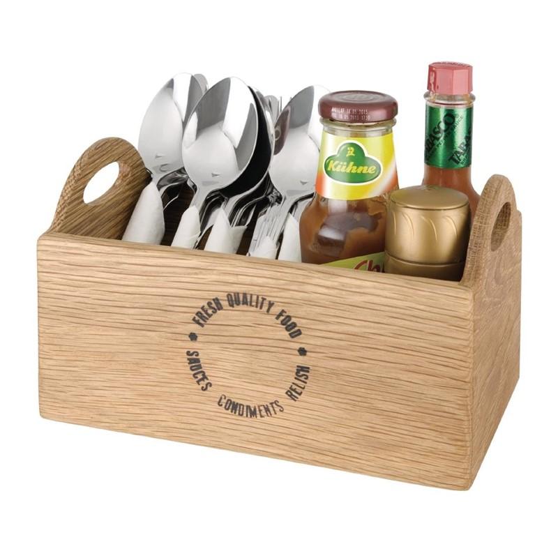 Especias y condimentos para cocinar en una caja de madera