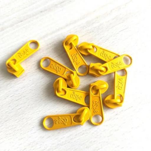 CURSOR PARA CREMALLERA NYLON DE 5 mm  YEMA CLARO 
