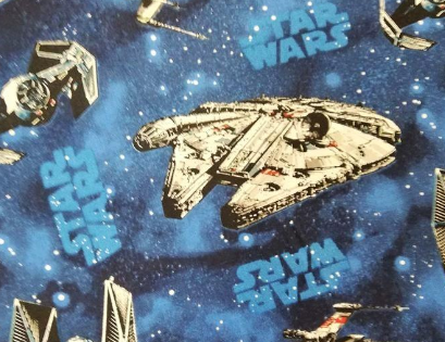 Tela Star wars estampada con naves espaciales