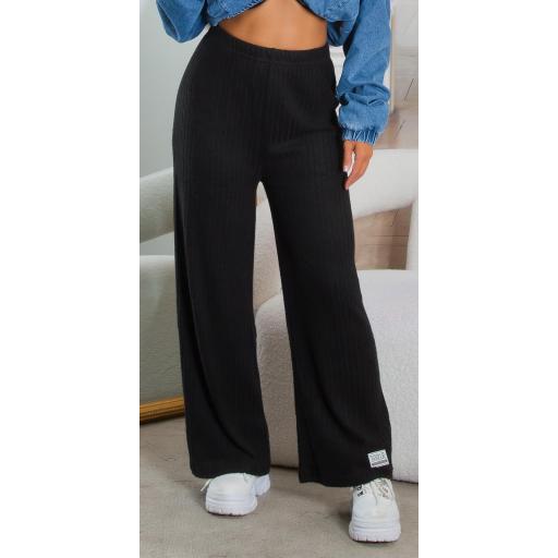 Pantalones negros acampanados y Canalé  [10]