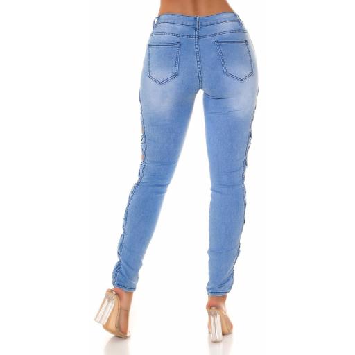 Jeans skinny con aberturas cintura baja [1]
