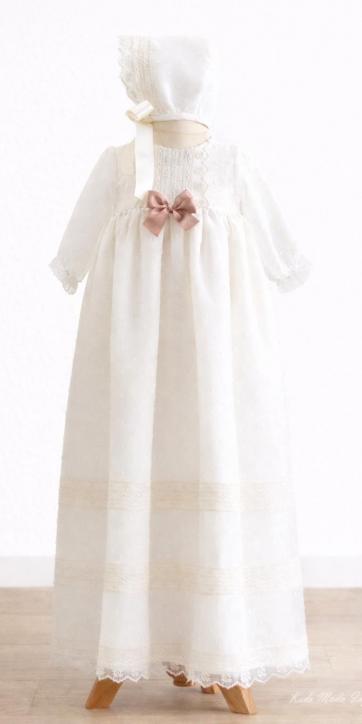 Faldón de bautizo bebé plumeti beige con lacito rosa empolvado | Eva Martínez Artesanía