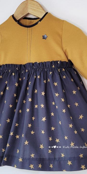 Vestido bebe mostaza con estrellas estampadas de Cuka Moda Infantil [1]