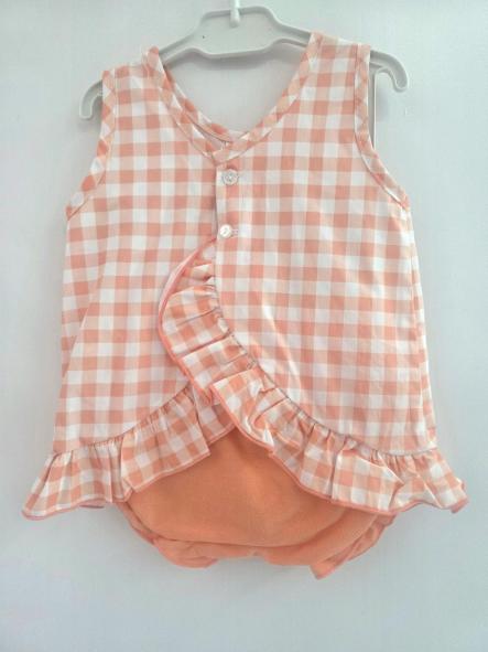 Jesusin niña cuadros naranja Calamaro. [1]