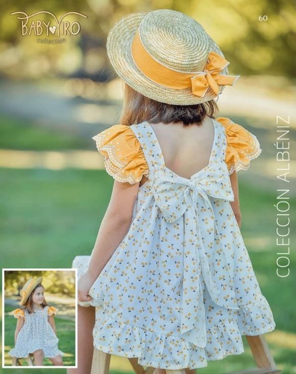  Vestido niña  florecitas amarillas de Baby Yiro .
