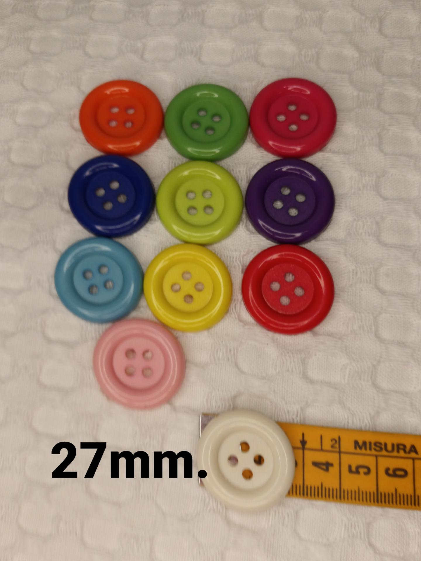 Botón payaso con ojales de colores