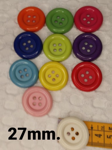 Botón payaso con ojales de colores