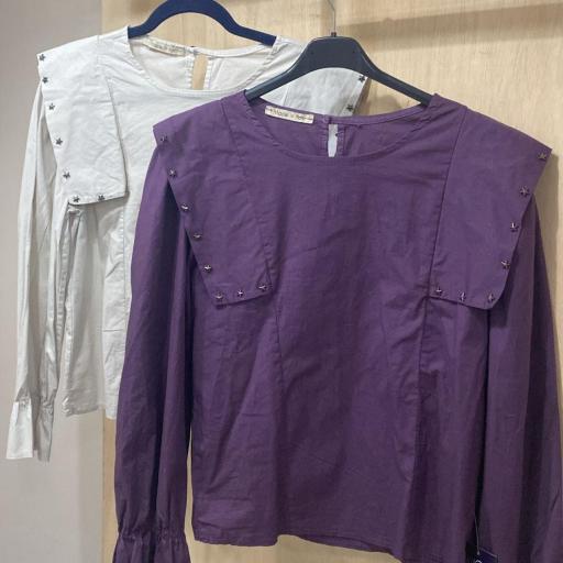 Camisa tachuelas solapa