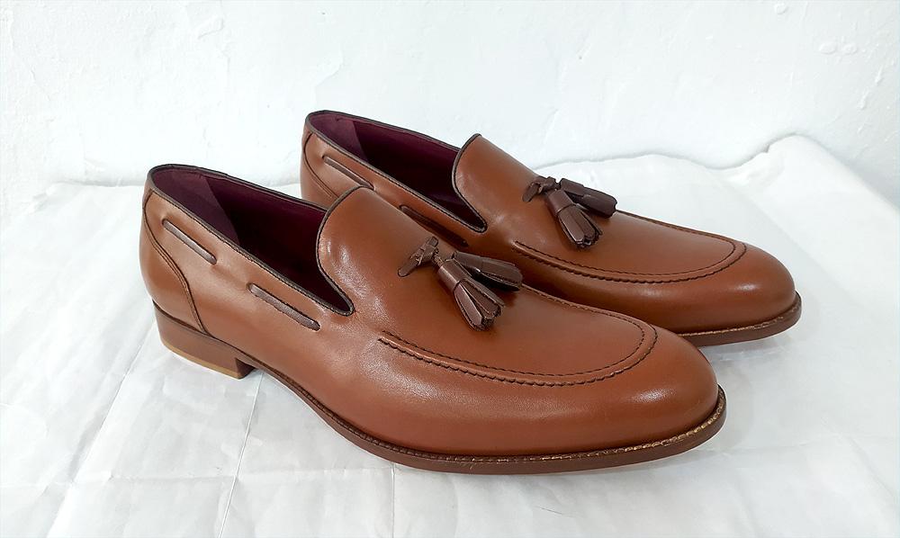 Mocasín borlas cuero