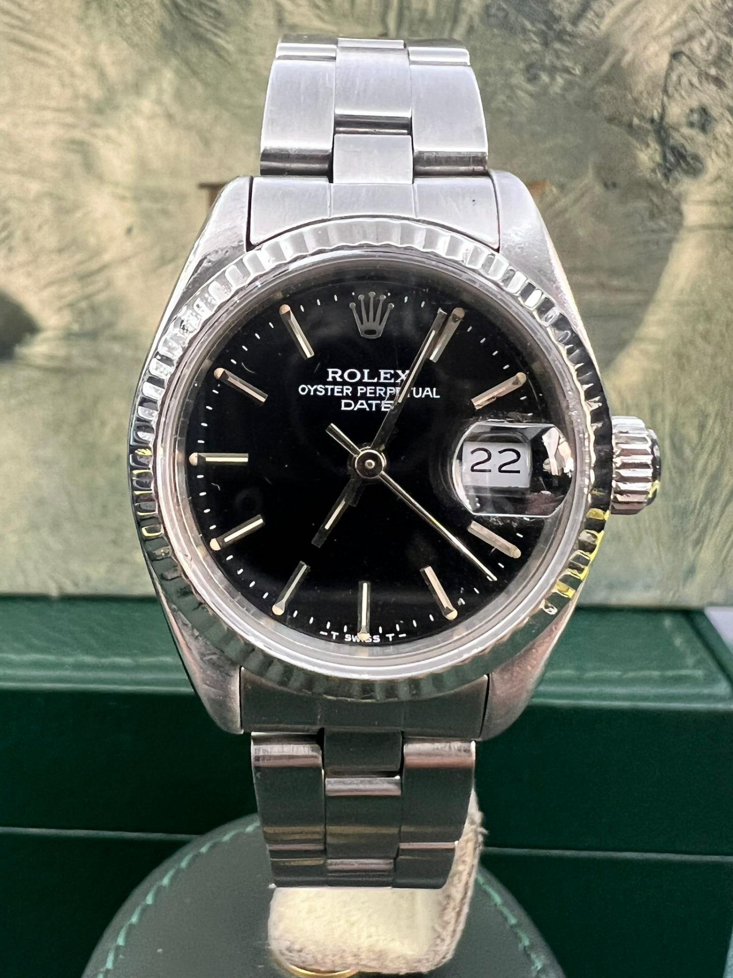 Rolex Lady 26mm black dial white gold bezel ref.69174 serial E57xxxx from 90's