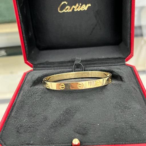 Cartier "LOVE" bangle en oro amarillo 18 Kt  ref.NFK893 talla 17 caja y Garantía.