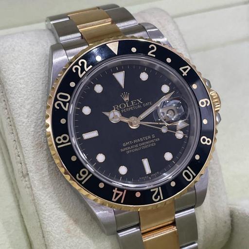 Rolex GMT ref.16713 from 2006 no holes case serial D black face steel gold [2]