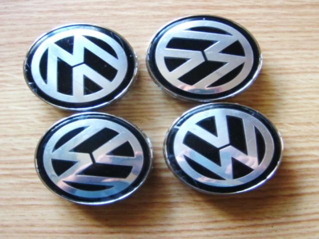 60 x 55 mm. Tapa  buje rueda  "VW Volkswagen"  Diametro:  Inte. 55 mm  Exterior 60mm.