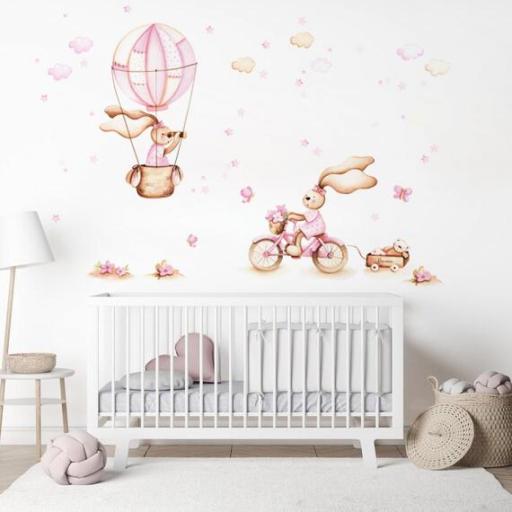 VINILO INFANTIL: Conejitas con bici y globo en tonos suaves con estrellas, nubes, flores y mariposas
