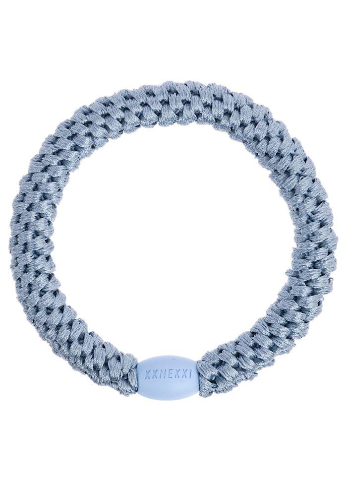 Goma de pelo azul mar