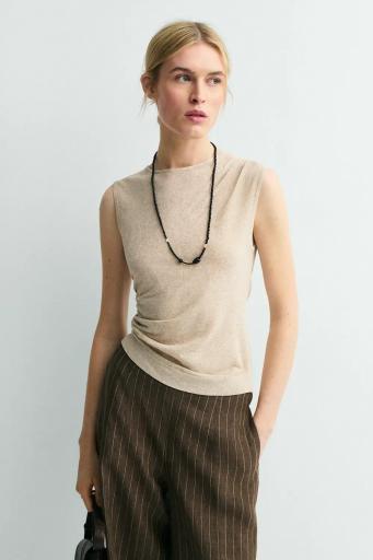 Top asimétrico topo kairos [4]