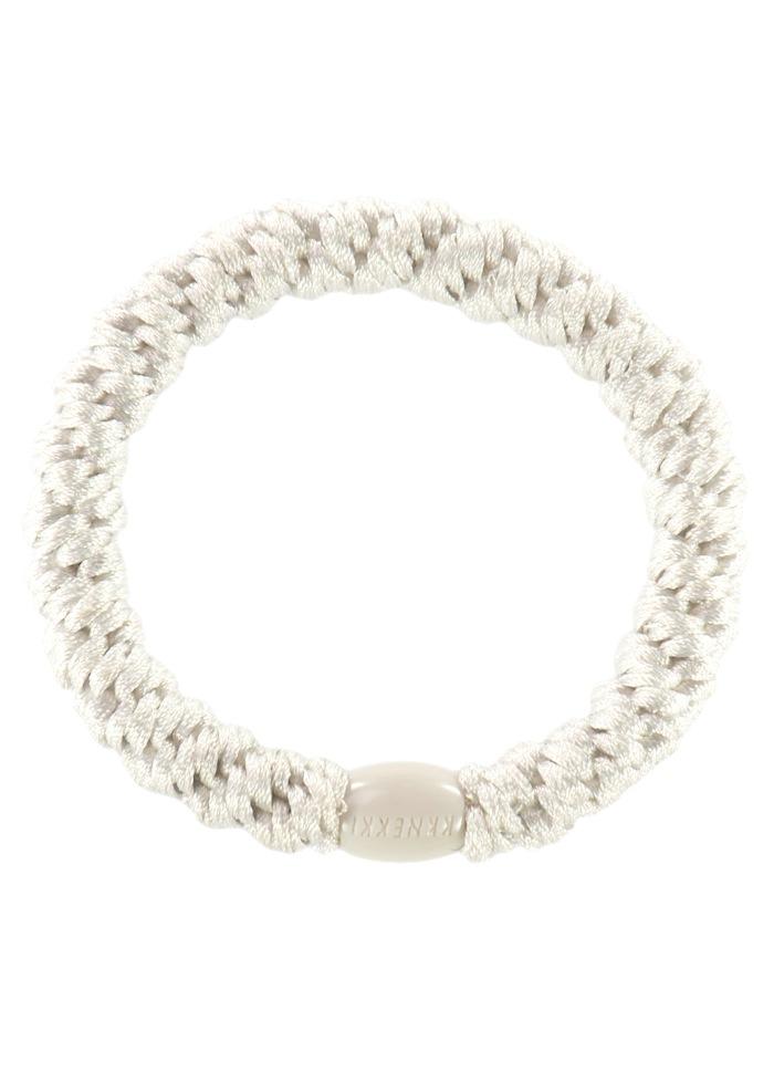 Goma de pelo blanca