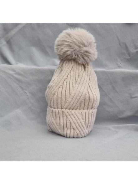 Gorro zig zag pompón beige