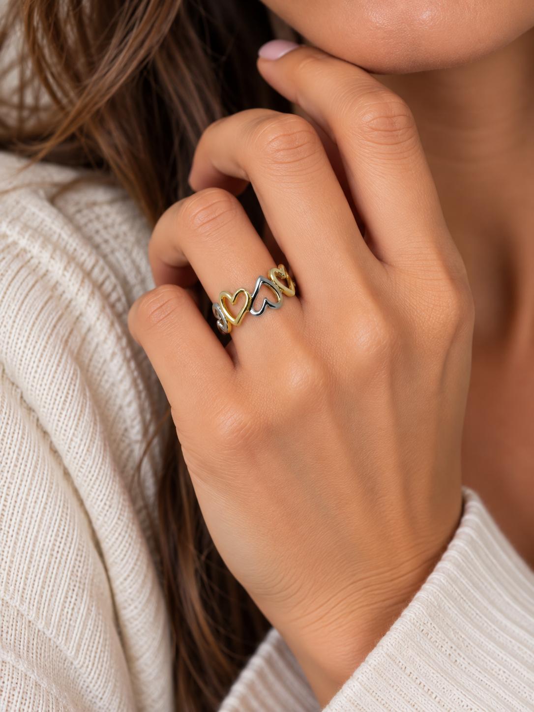 Anillo ajustable de corazones dorados y plateados de acero