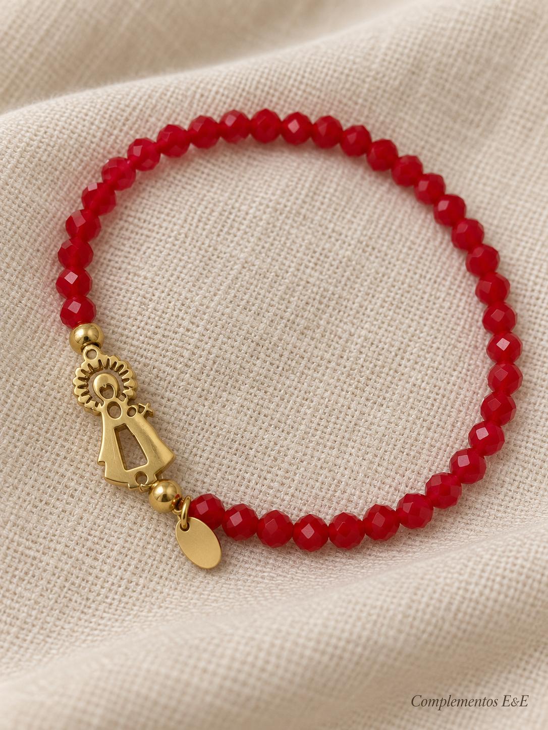 Pulsera elástica de cristales rojos con Virgen del Pilar en acero dorado