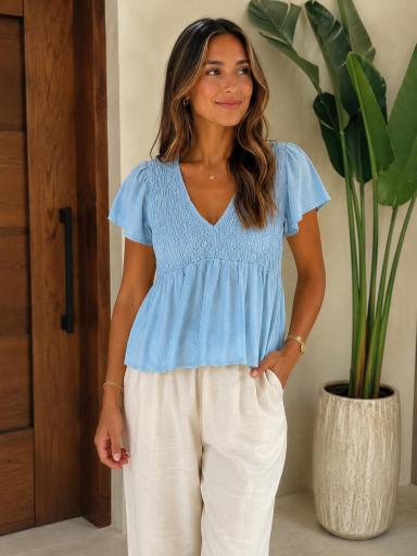 Top azul claro de lino con escote en pico para mujer [3]