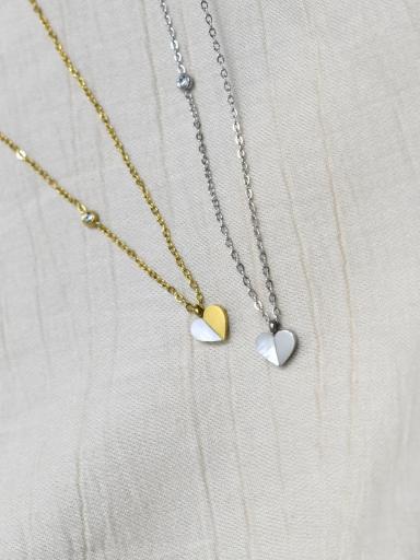 collar acero con corazon de nacar dorado