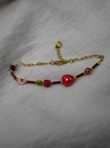 pulsera elegante roja dorada con piedras [1]