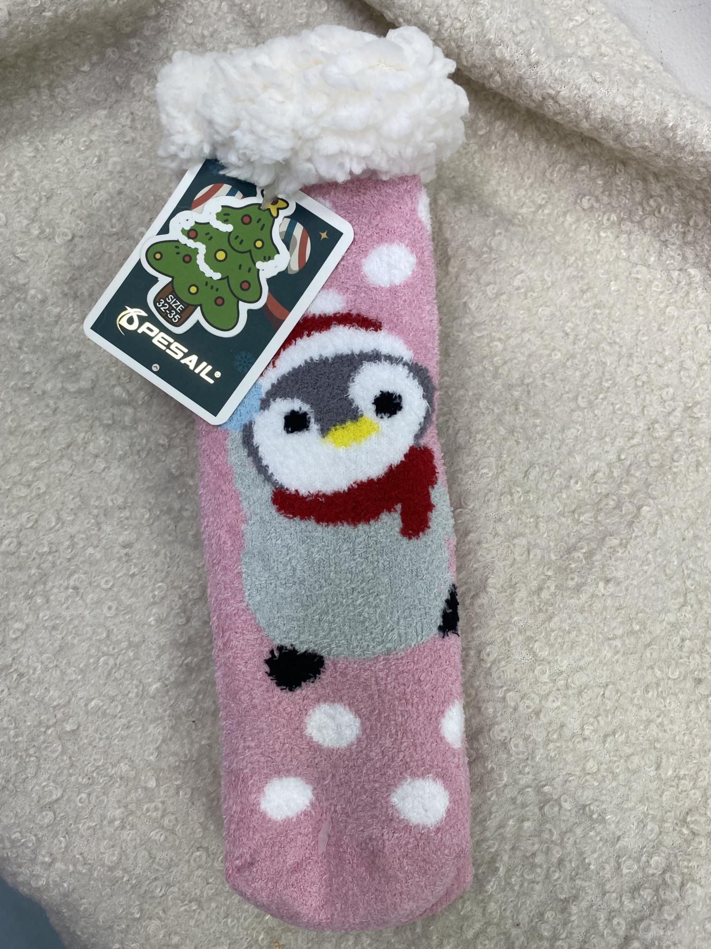 Calcetines navideños infantiles talla 32-35 con diseño de pingüino.