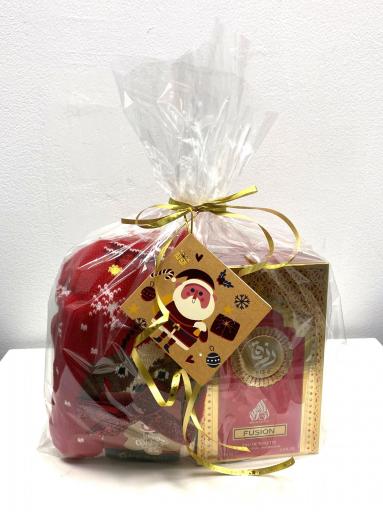 Detalle del perfume unisex junto a los calcetines navideños talla 35–40 en pack de regalo. [1]