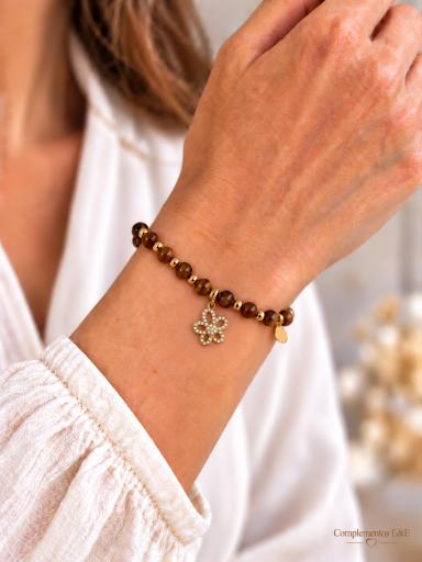 Pulsera marrón y dorada con colgante de flor y pequeños detalles brillantes [2]