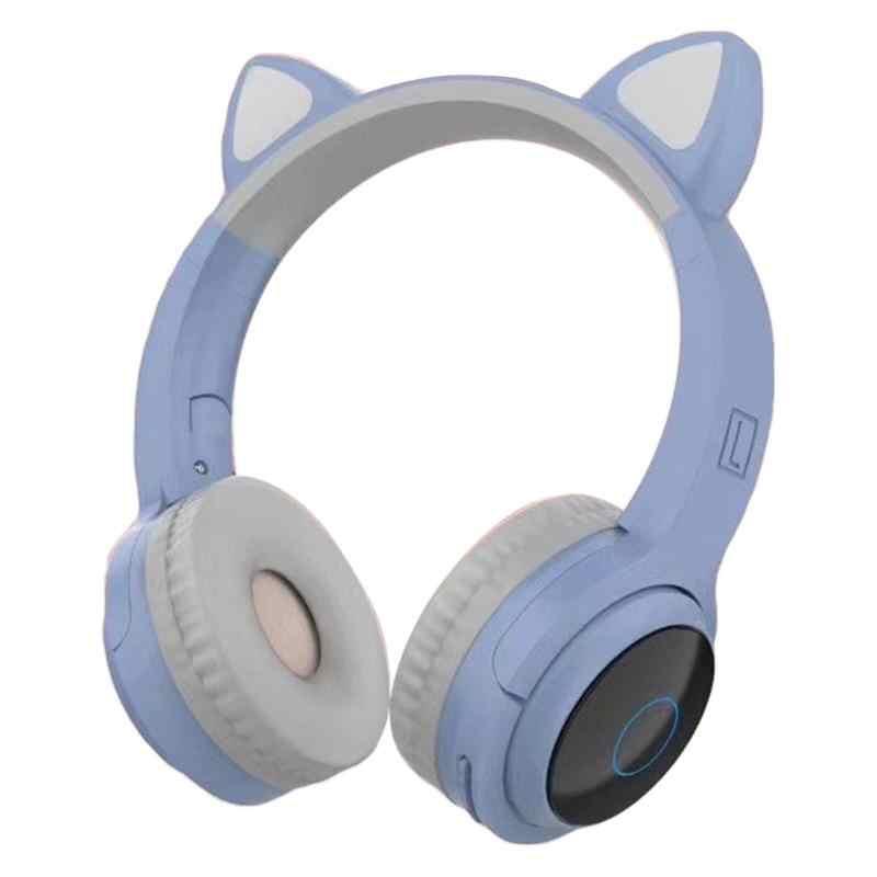 Auriculares gatito azul con luz led en las orejas.