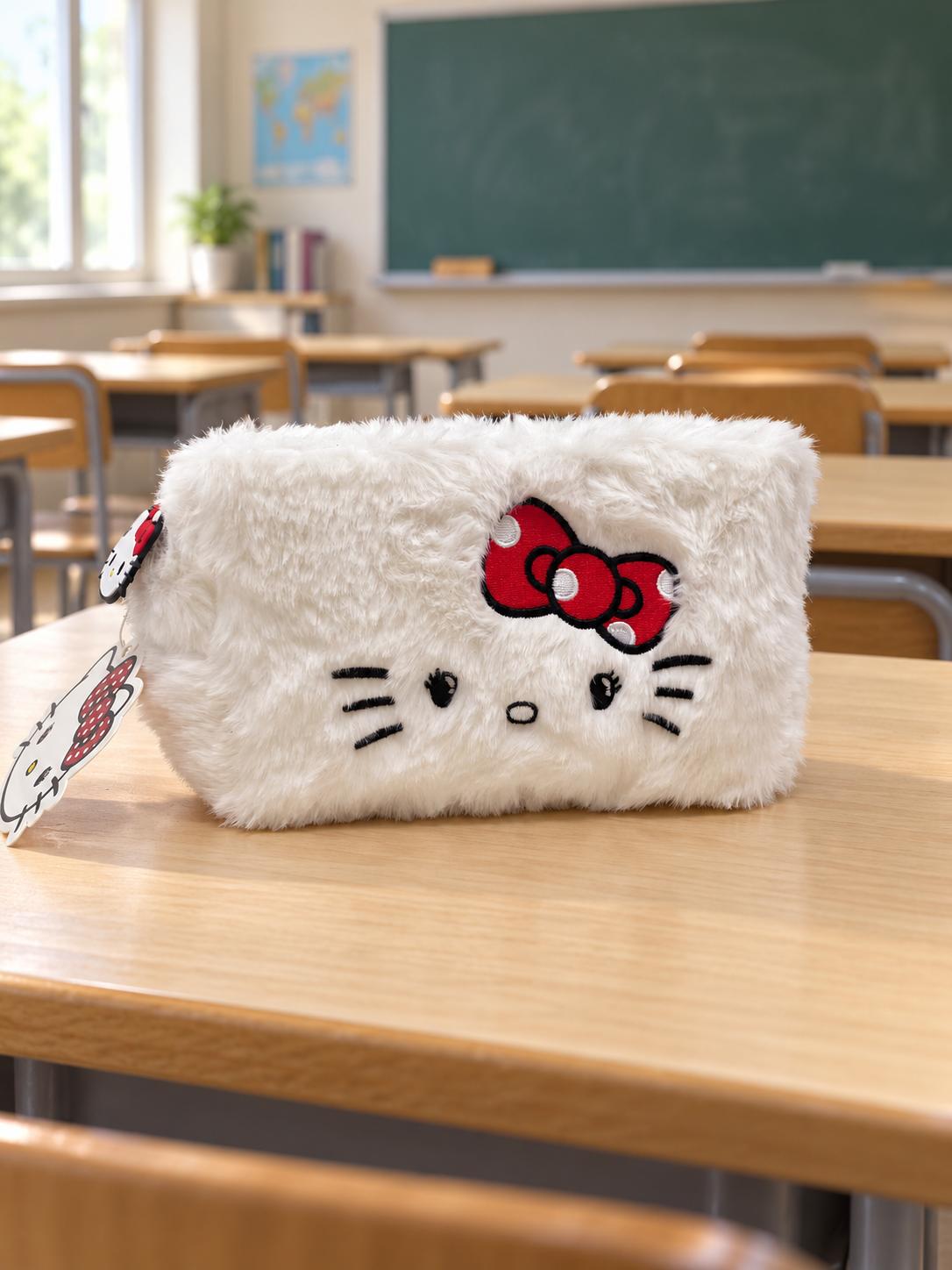 Estuche Hello Kitty de peluche blanco con lazo rojo
