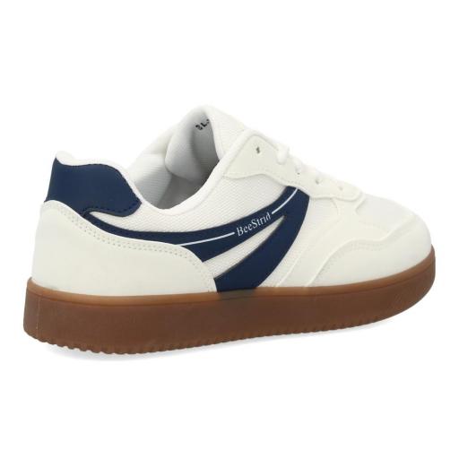 Zapatillas deportivas casual de mujer blancas con detalles azul marino y suela caramelo [1]
