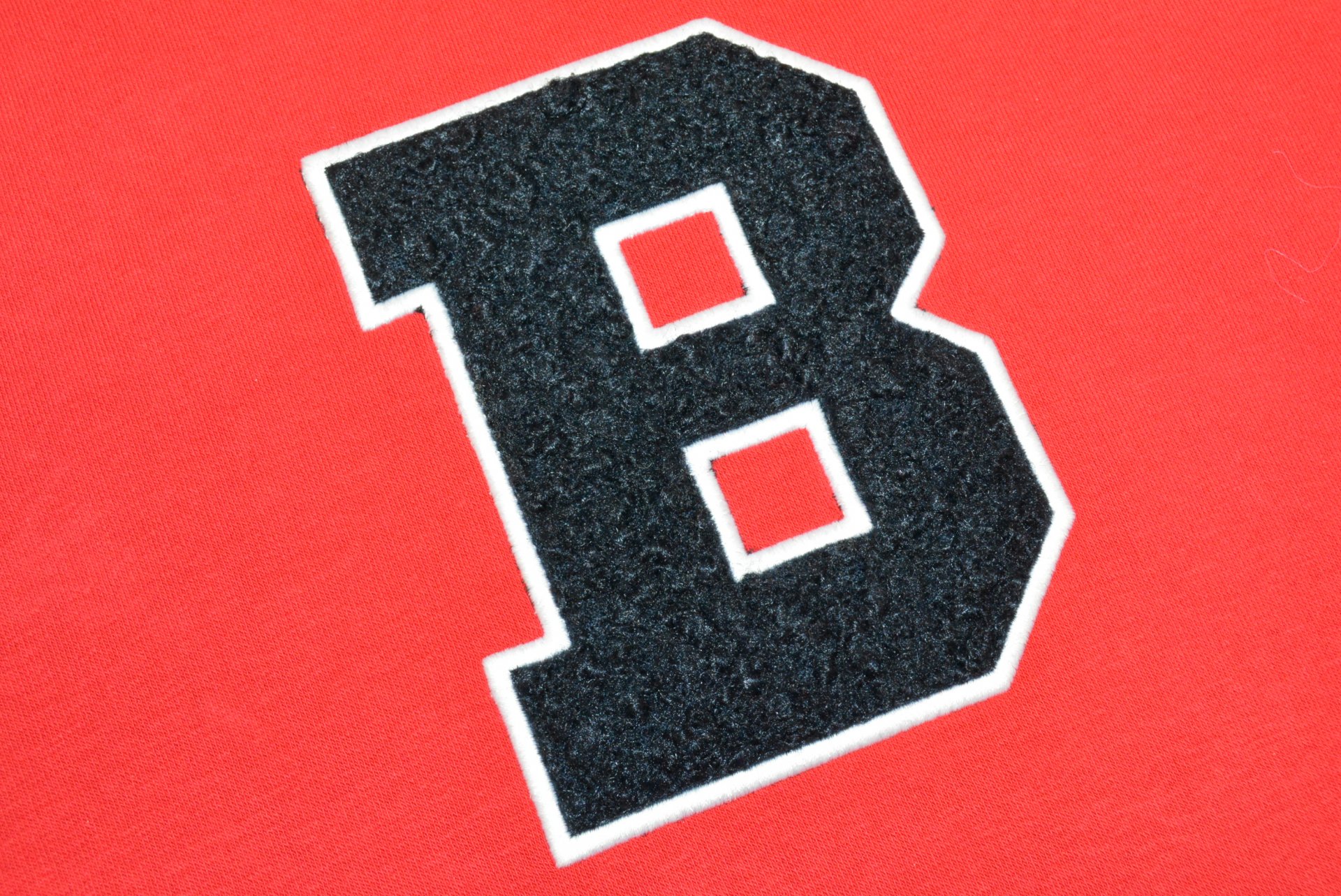 Paño azul marino (sudadera roja borde blanco) 