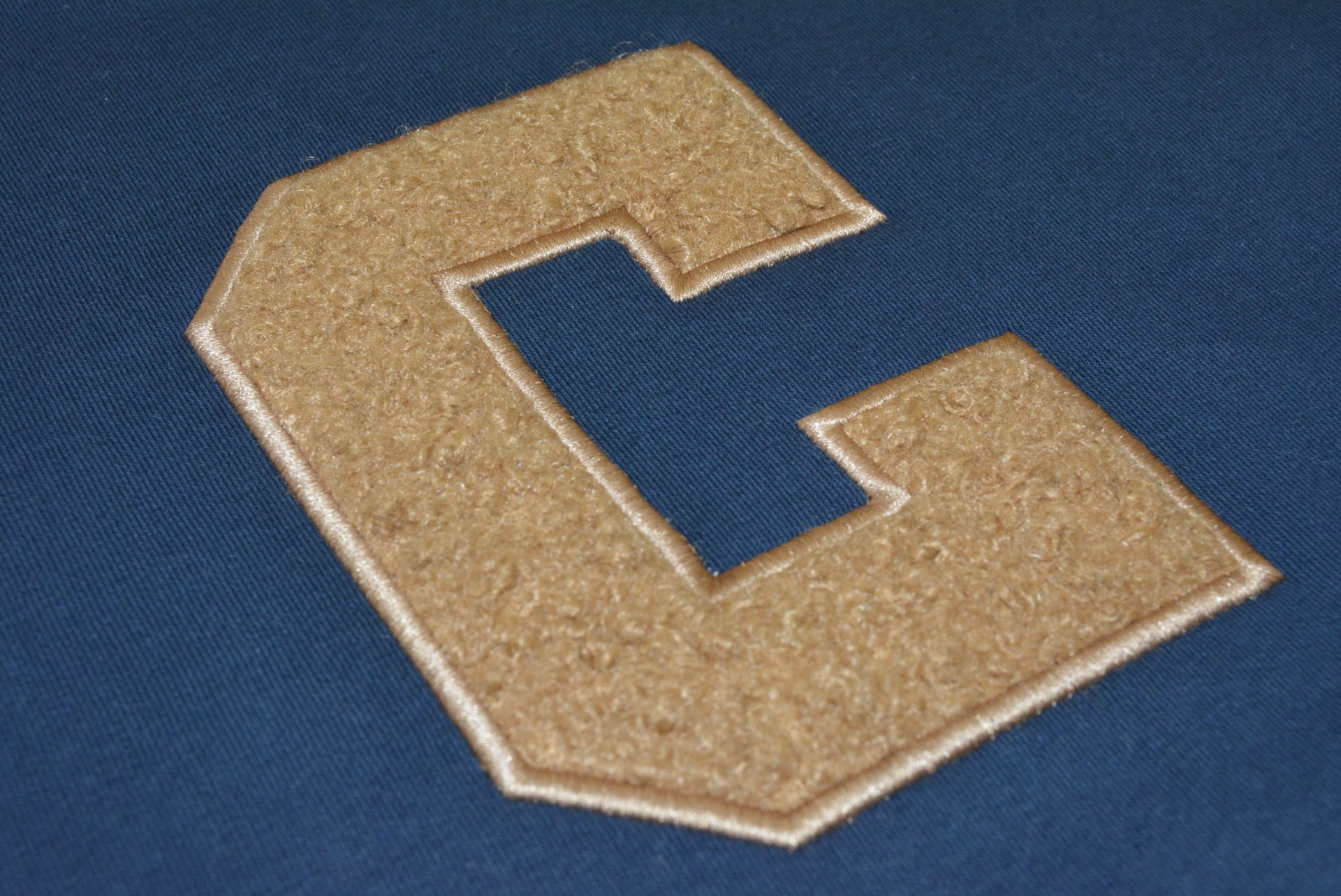 Paño camel (sudadera azul marino borde camel)