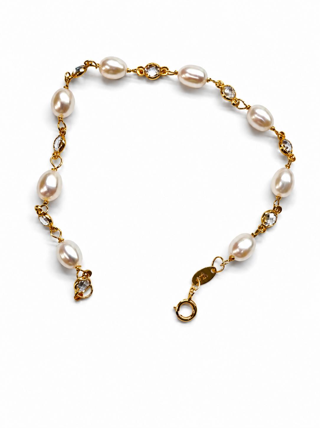 Pulsera oro 18K niña comunión con perlas ovaladas y circonitas