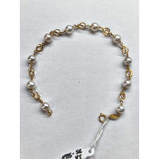 Pulsera oro 18K niña comunión con perlas y eslabones jaula