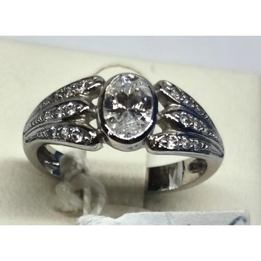 Sortija de oro blanco 18K con circonita central para mujer talla 16
