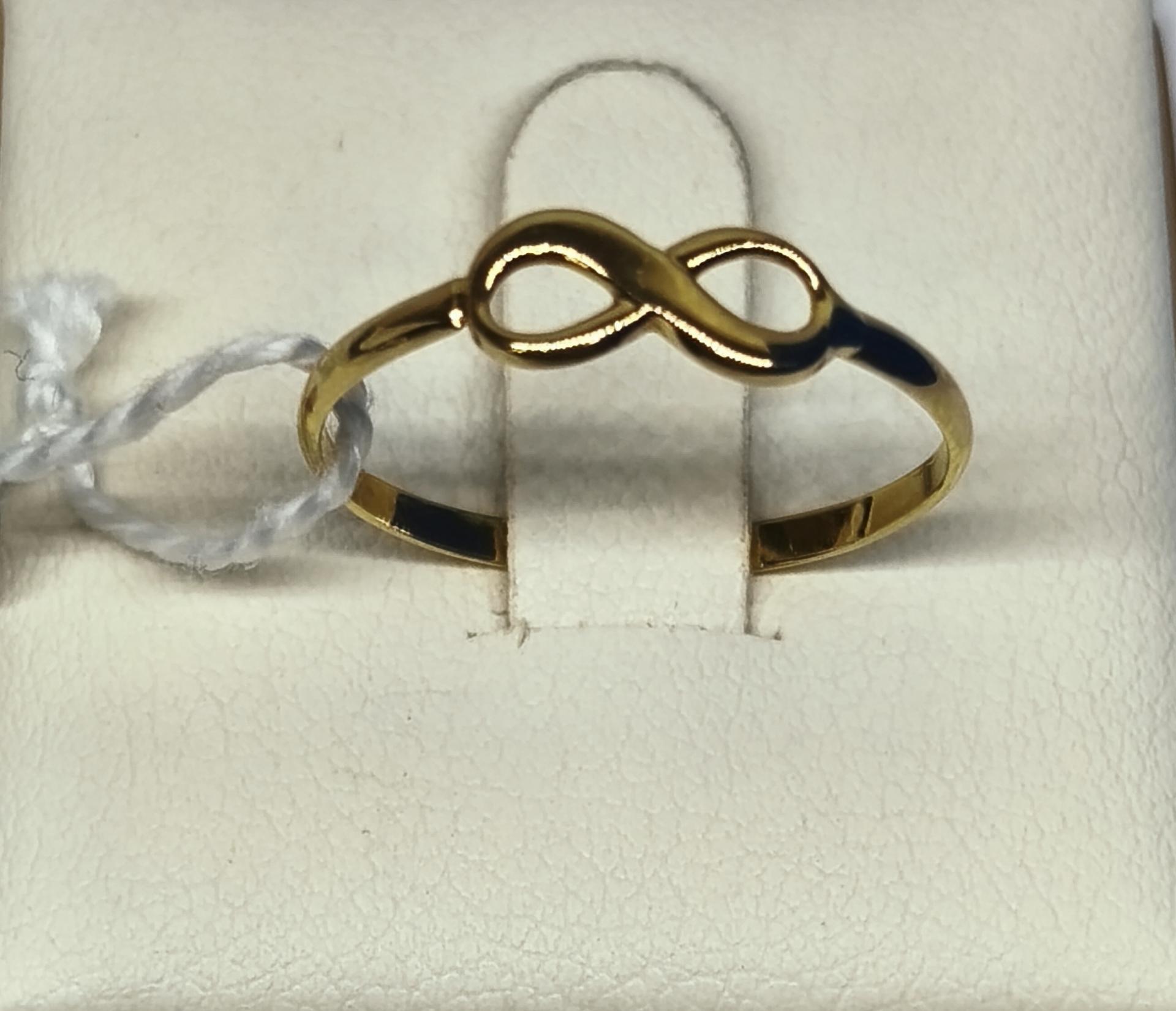Anillo infinito oro amarillo 18K fino juvenil para mujer