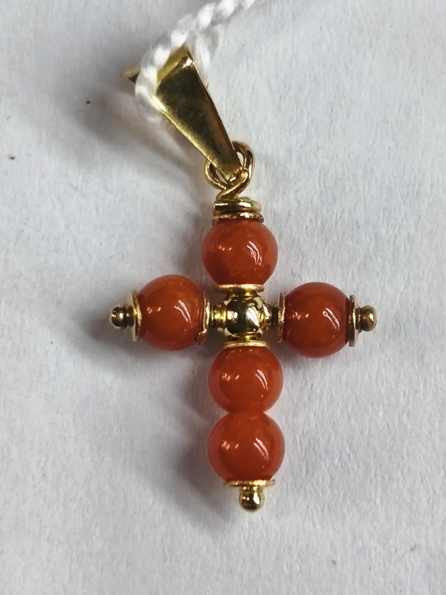 Cruz de Oro 18 quilates y Cruz de Oro con Corales