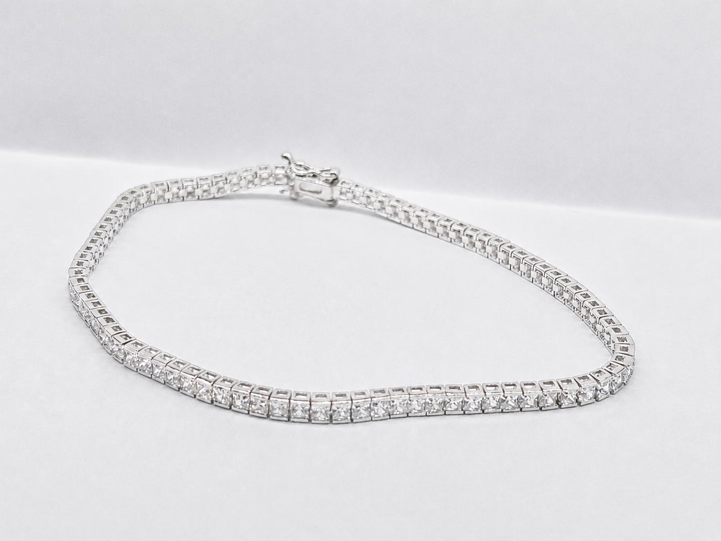 Pulsera rivière oro blanco 18K con circonitas princesa mujer