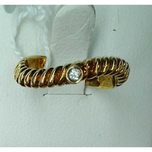 Anillo oro amarillo 18K ondulado con diamante central para mujer