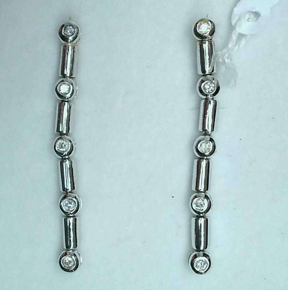 Pendientes largos novia oro blanco 18K con diamantes talla brillante