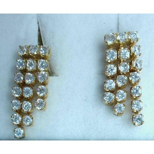 Pendientes flecos oro amarillo 18K con circonitas articuladas
