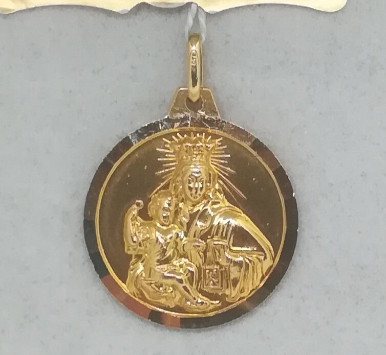 medalla oro virgen del carmen lapidada