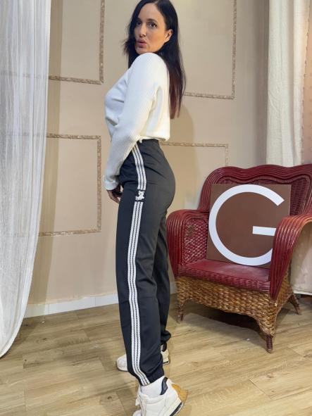 PANTALON NEGRO RAYAS LATERALES BLANCAS CON OSITOS [0]