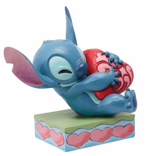 Figura Stitch abrazando un corazón 6 cm [1]