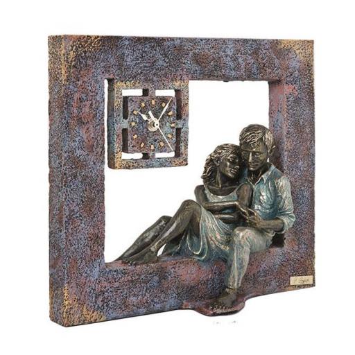 escultura-pareja-leyendo-un-libro-con-reloj-sobre-cuadrado-anglada-278-descanso-acabado-bronce-regalo-aniversario-boda-oro-plata-25-50-lomejorsg.jpg [0]