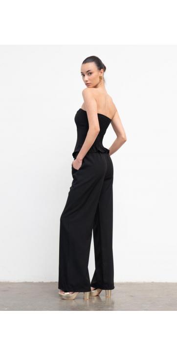 Conjunto de dos piezas corpiño y pantalón elegante para mujer, ideal para eventos especiales." [2]